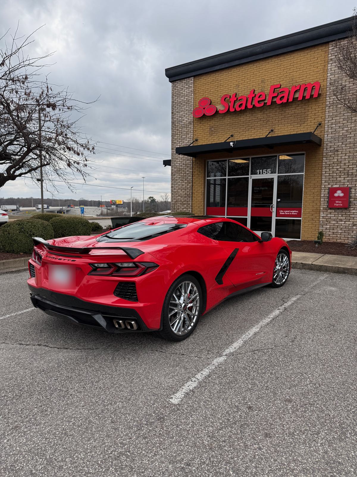 Red Corvette parked outside Wes Harris's insurance office in Jackson, Tennessee